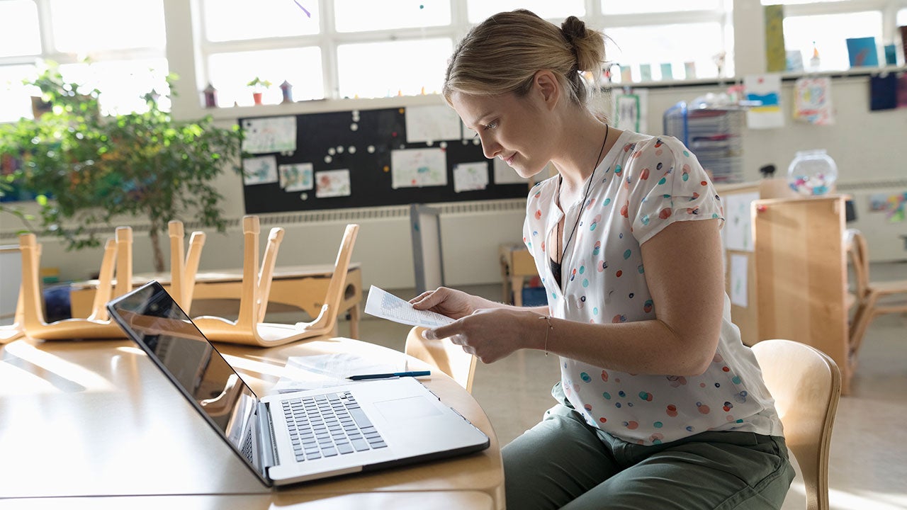 Woman filling out 401k paperwork