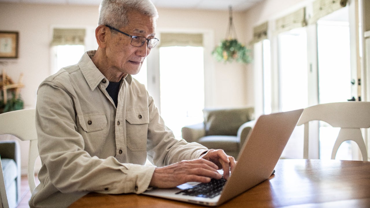 Man looking at credit card options online