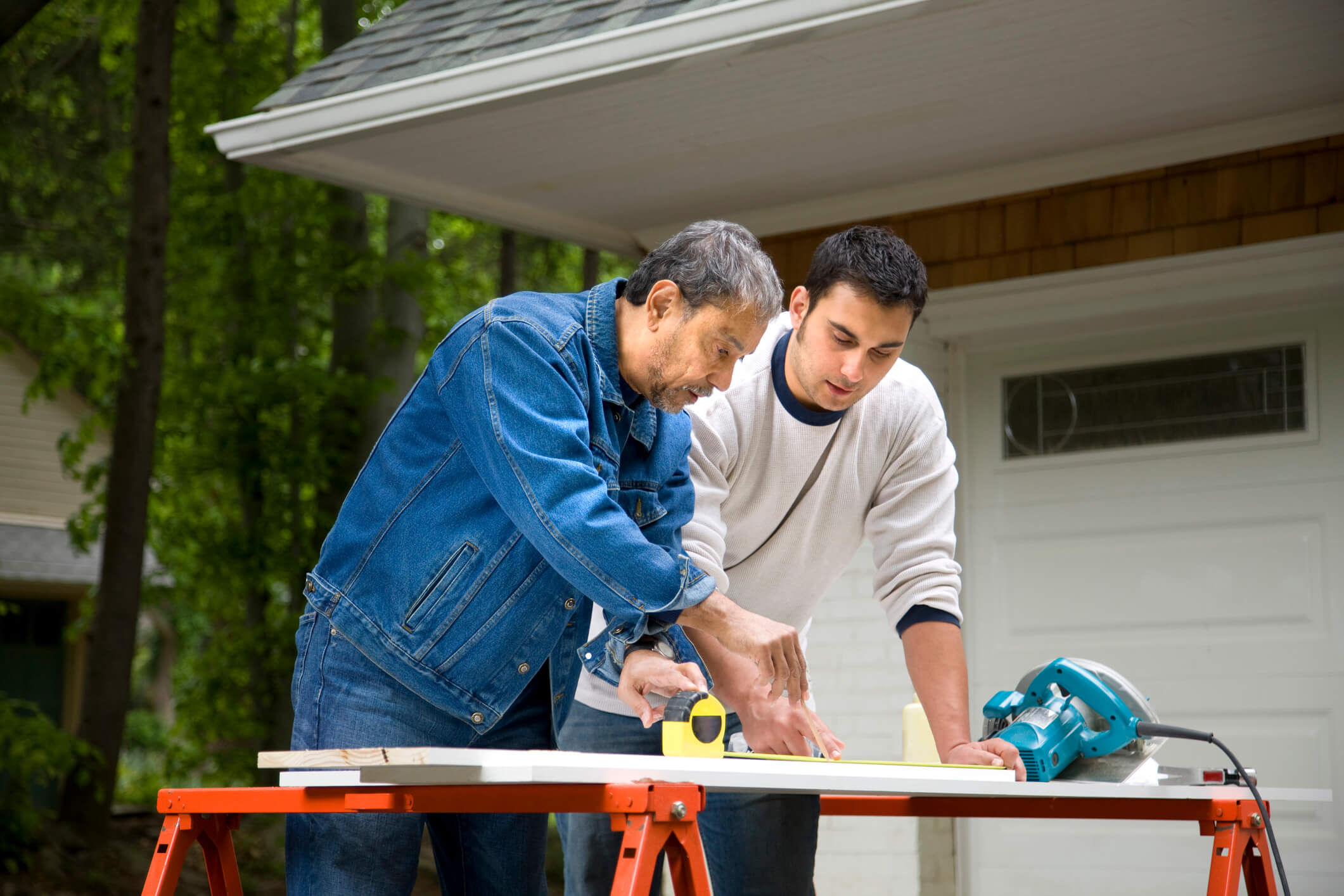 Father, son working together