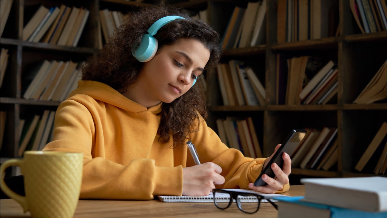 Teen student works on homework