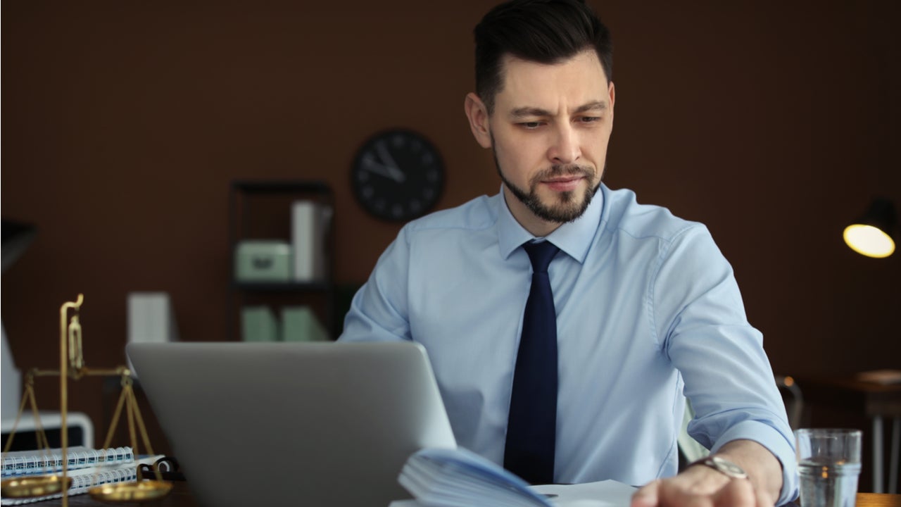 Lawyer works at his desk