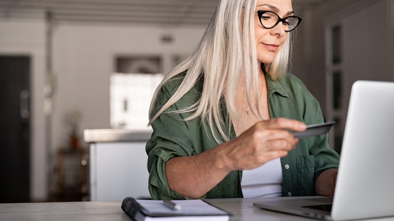 Person looking at credit card