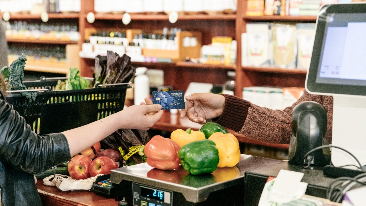 Person paying with Blue Cash Preferred card