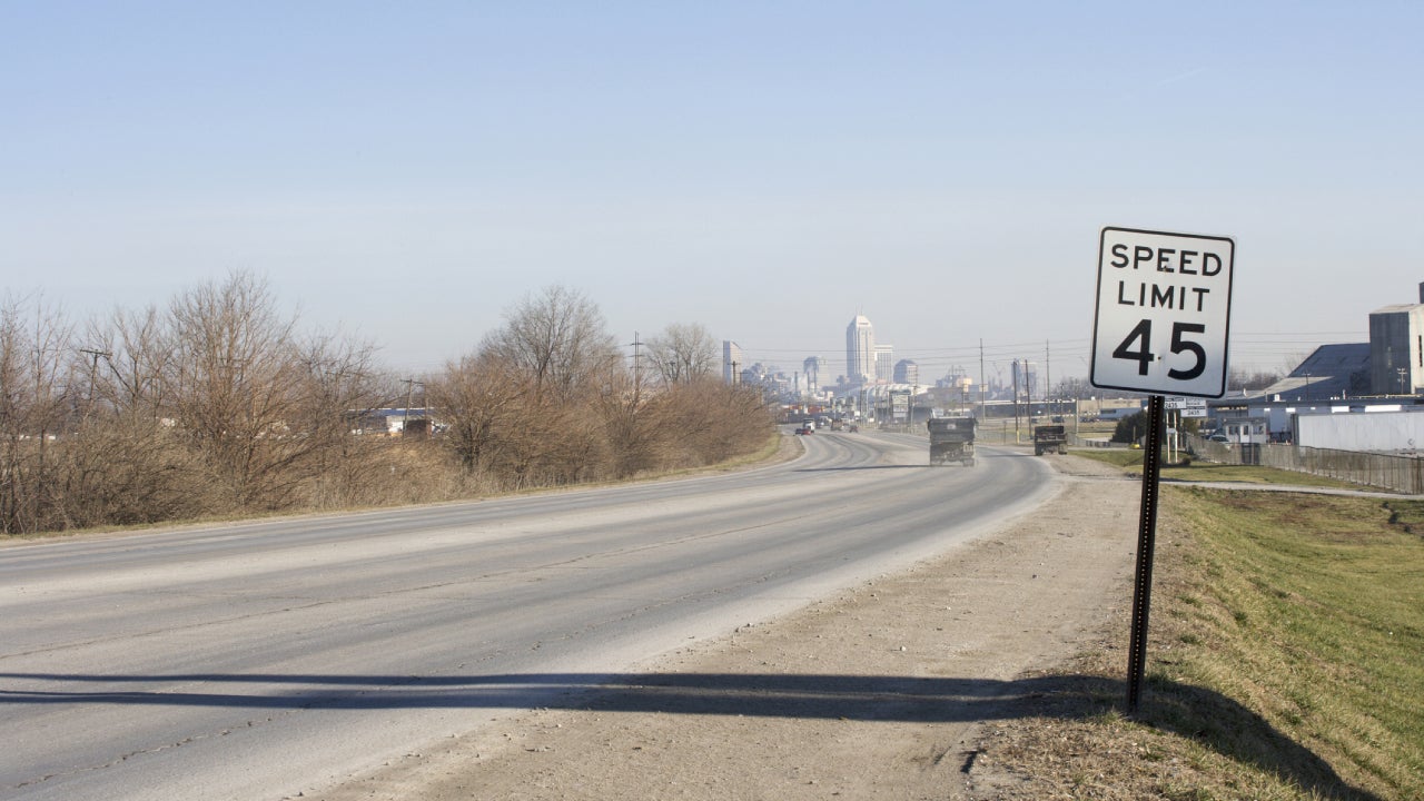 Sign on side of industrial road