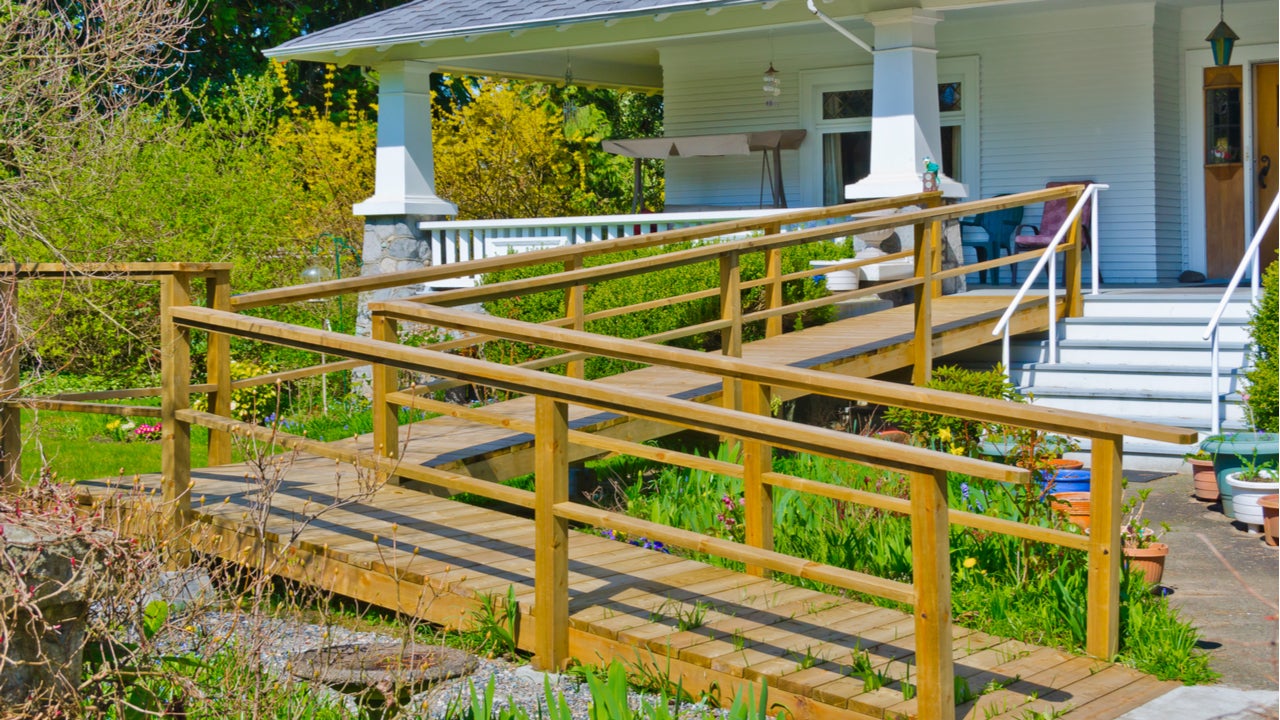 Home with wooden wheelchair ramp