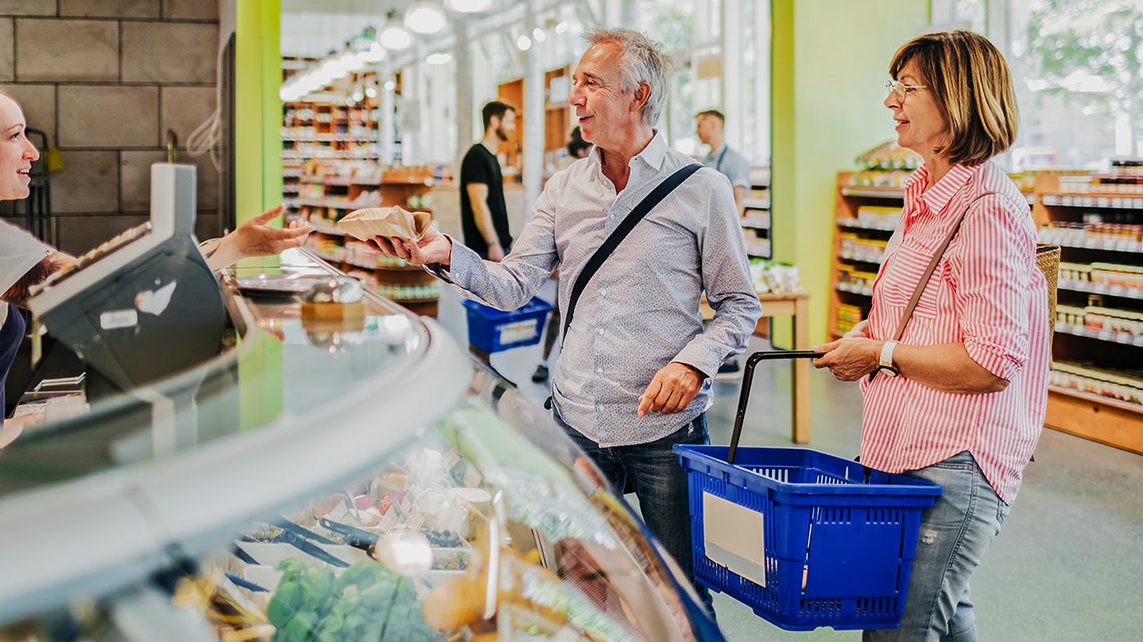 Couple Shopping At Supermarket