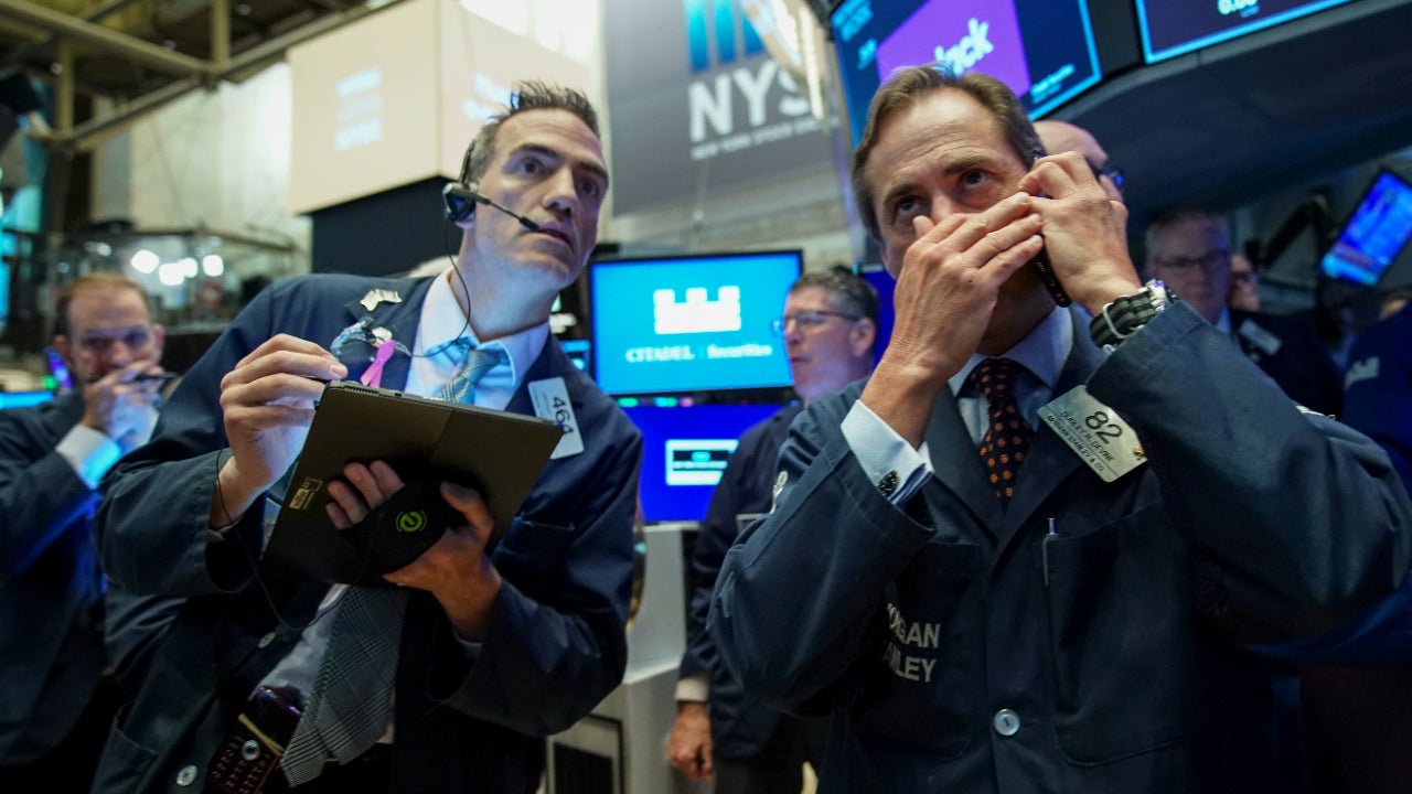 Traders on the floor of the New York Stock Exchange