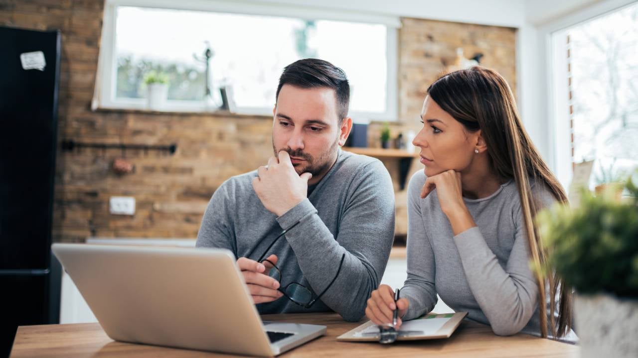 Couple managing finances.