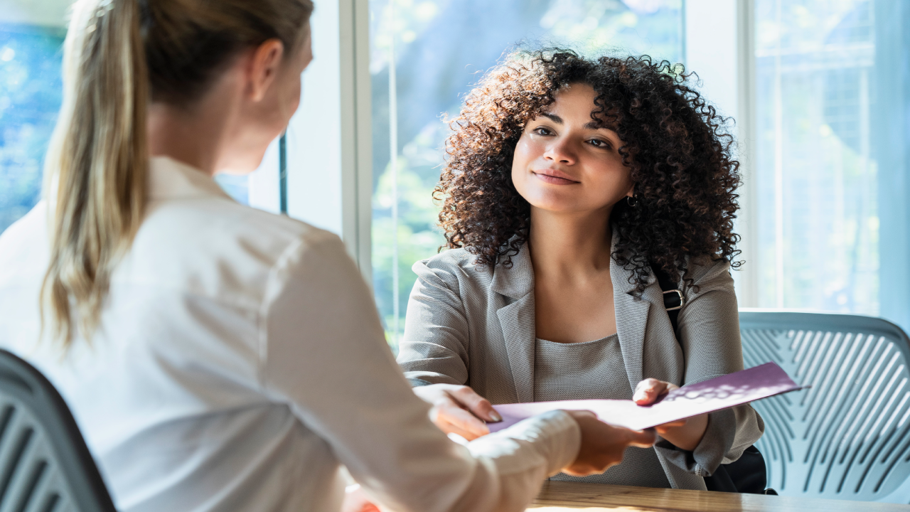 BIPOC woman meeting with female financial advisor