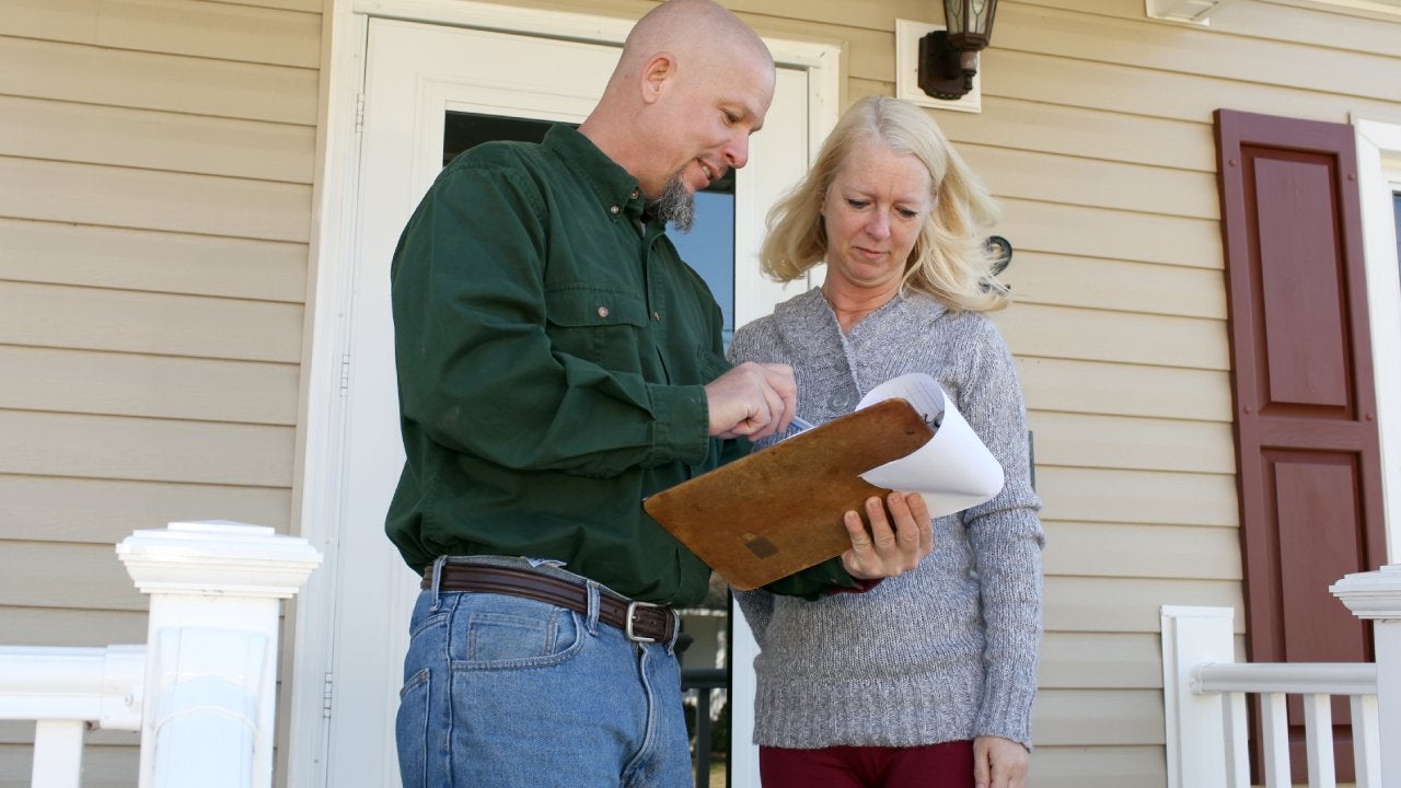 Contractor going over details of home inspection.