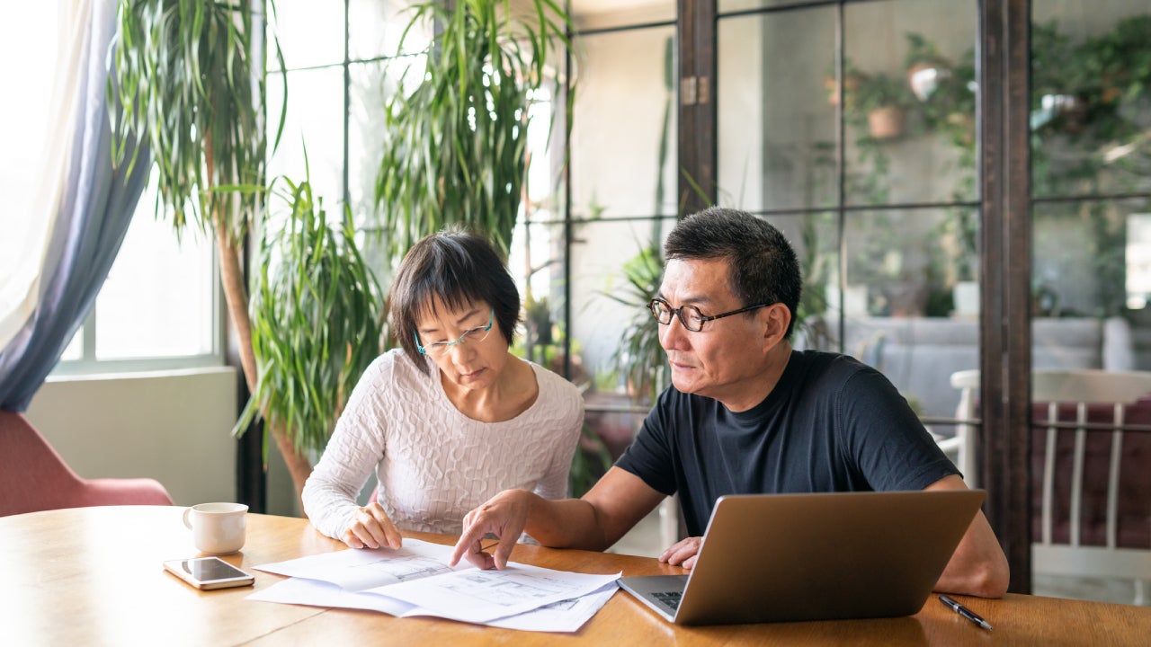 Couple working in a design studio.