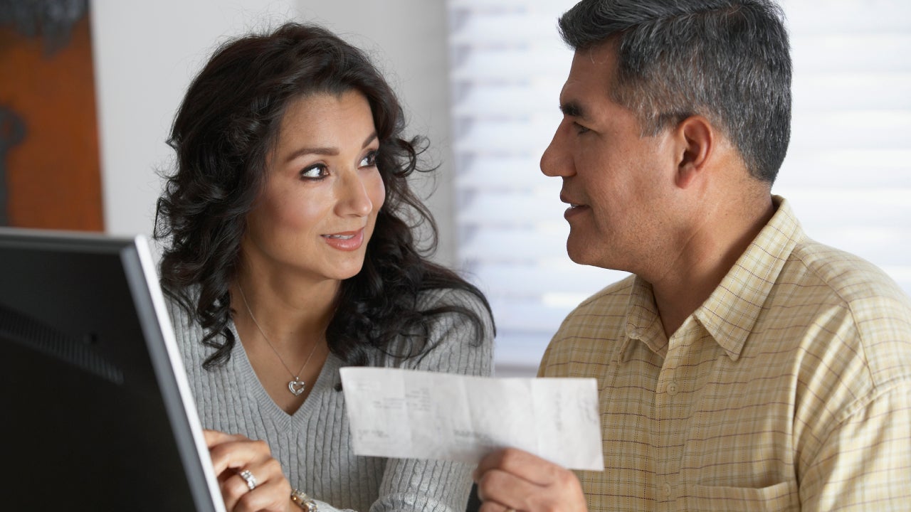 Couple in front of computer