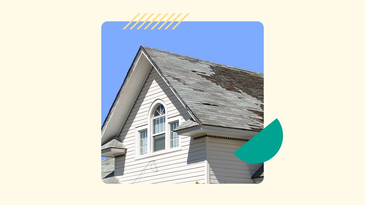 Shot of a house roof with damage and tiles that need to be replaced