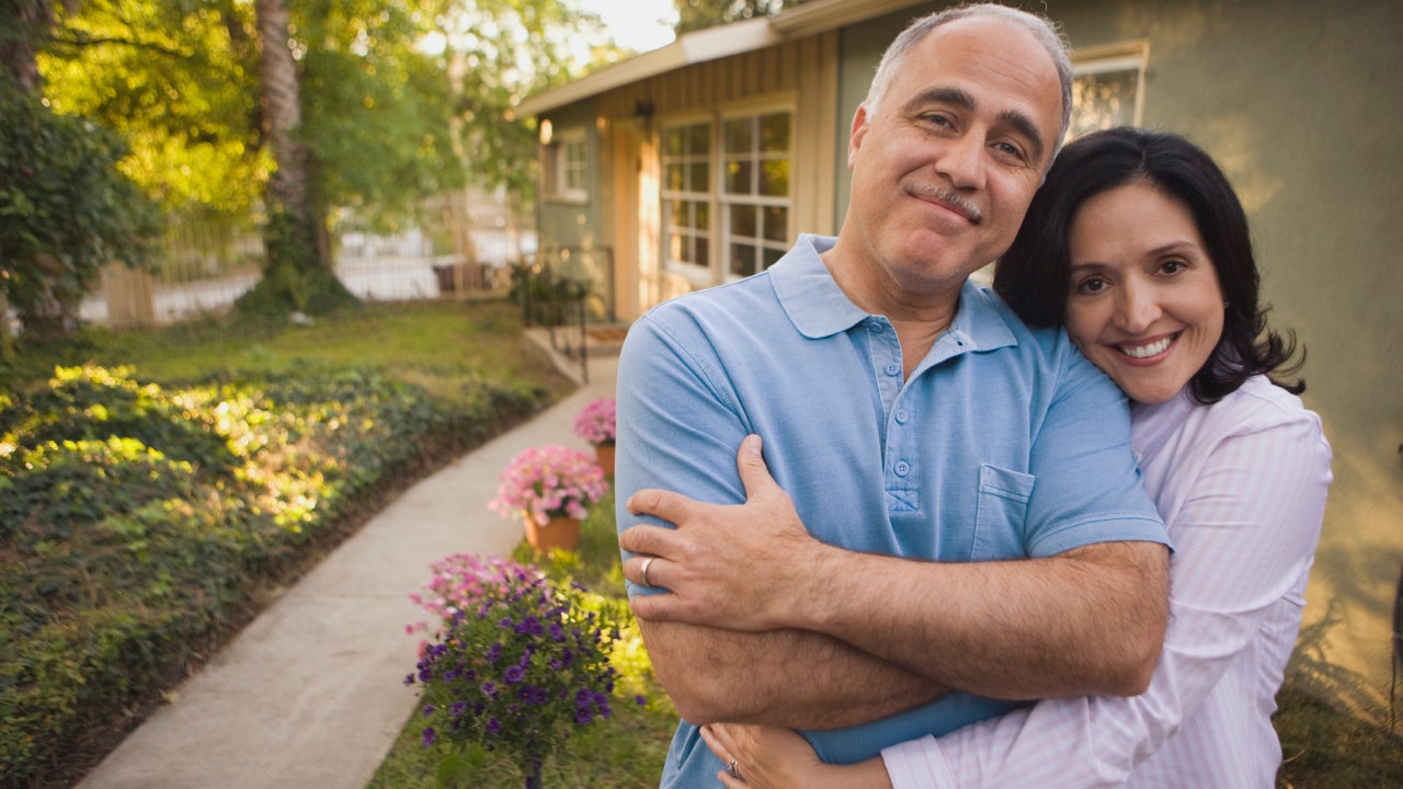 Older couple in each others arms