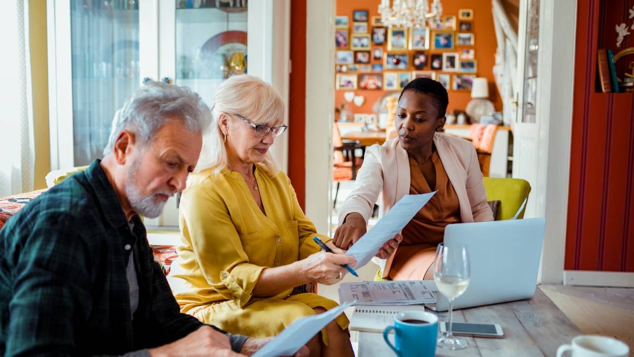 Financial advisor talking to clients