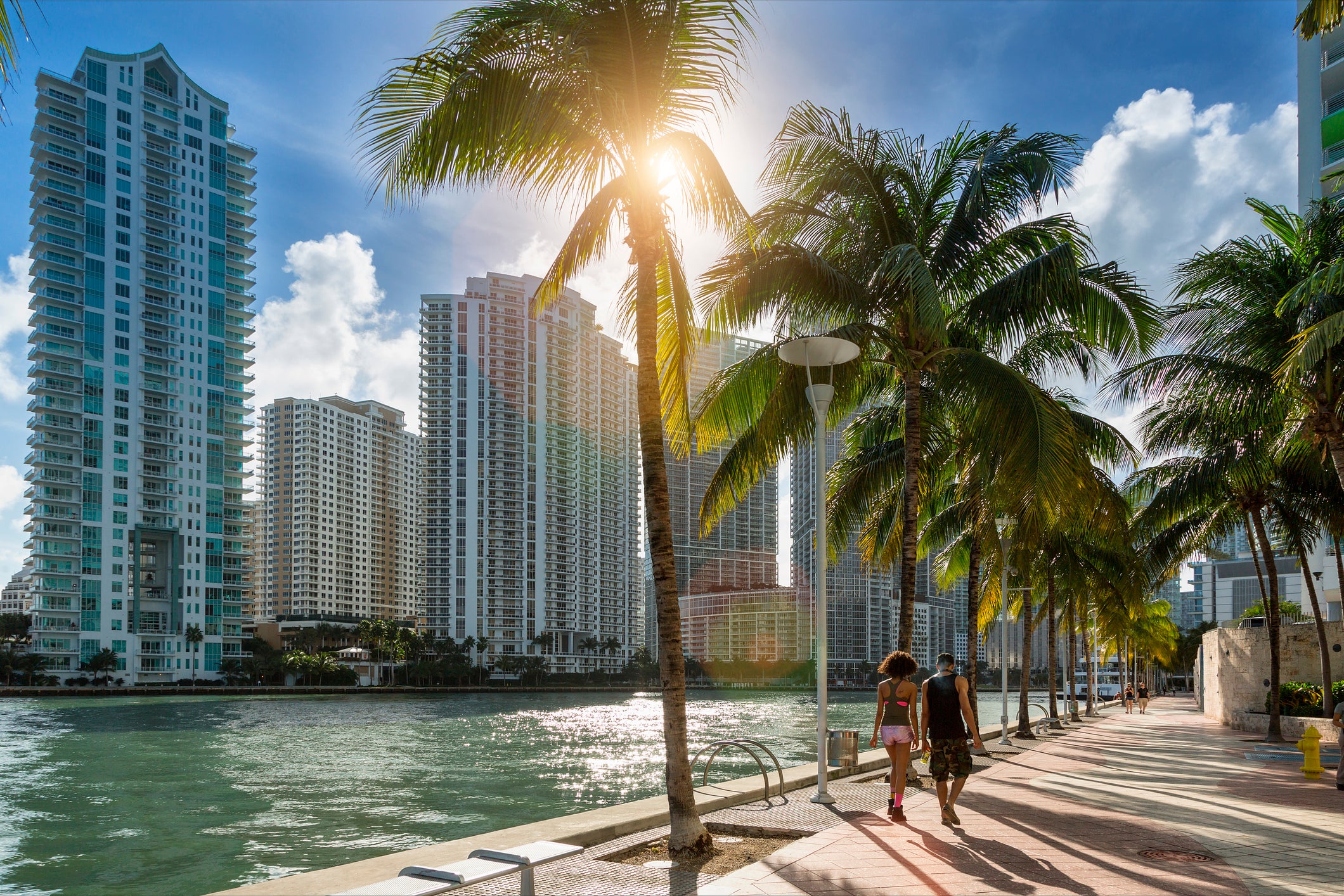 Downtown Miami, people walking along Miami River