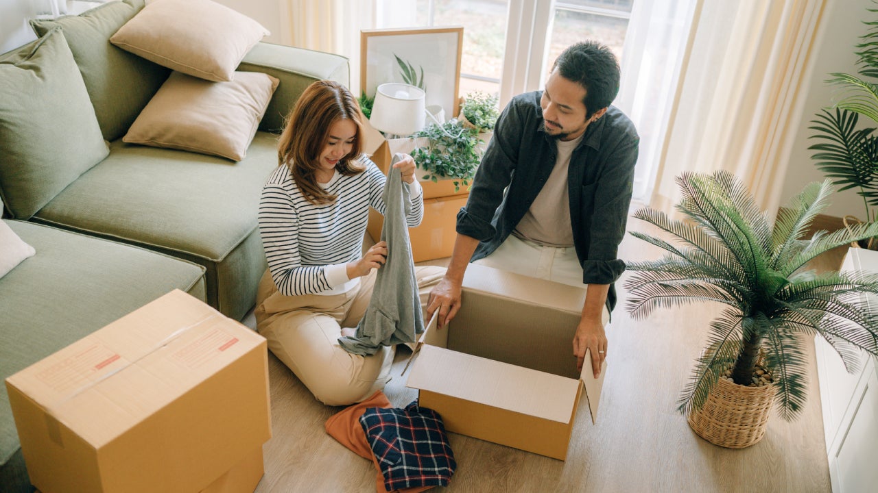 Happy couple moving new house