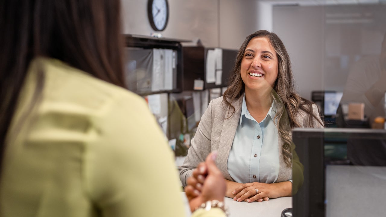 A friendly female customer service representative