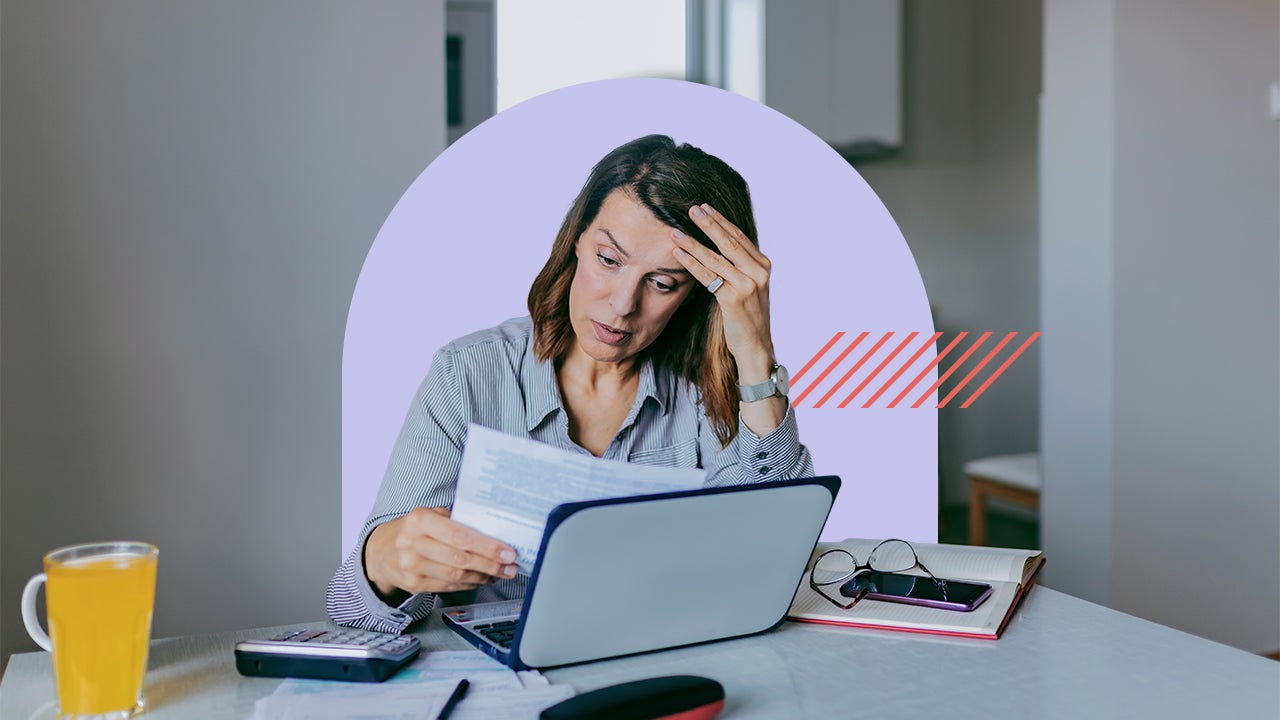 Women reviewing document feeling stressed.