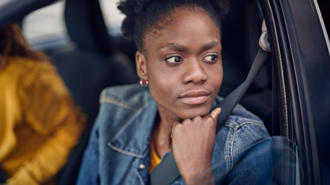 Young woman in car