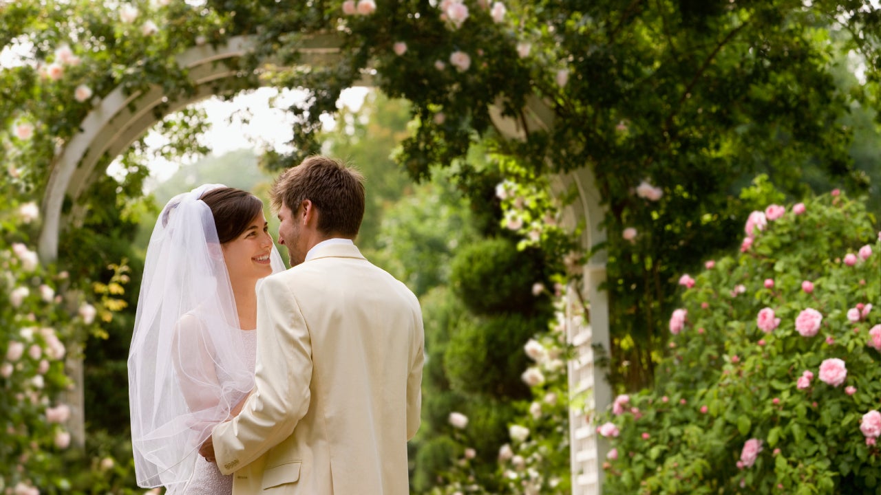 Young Couple Getting Married in Garden