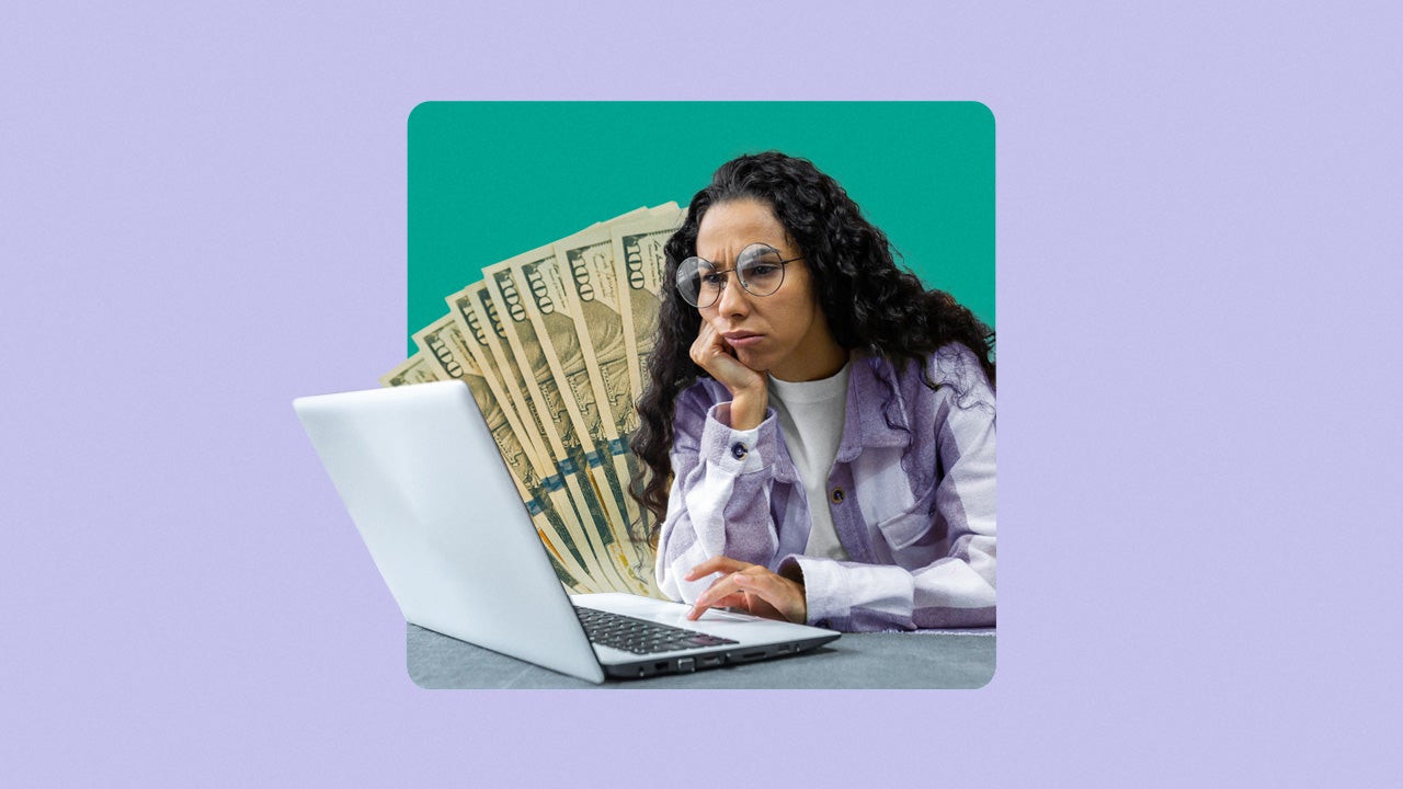 Woman frowning at a laptop screen