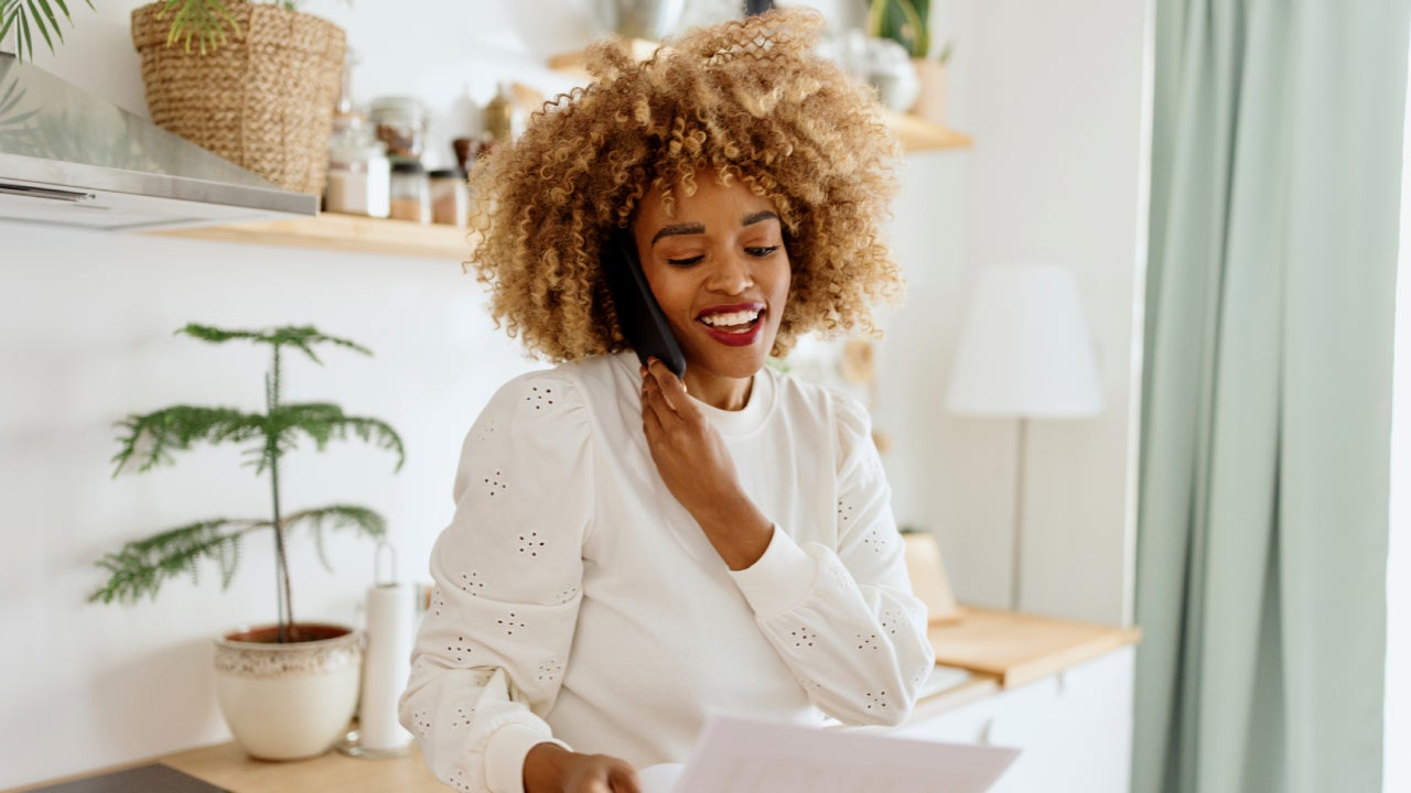 Smiling woman talking with someone