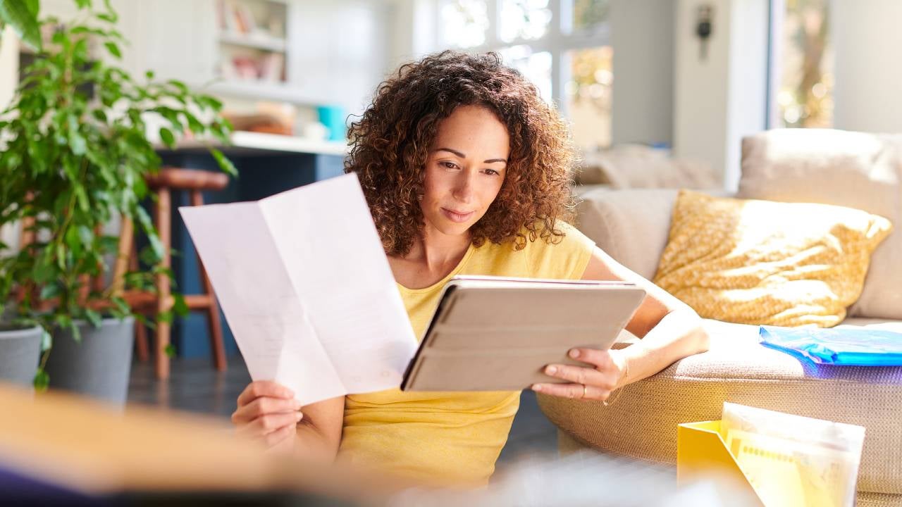 Woman checking her home finances online