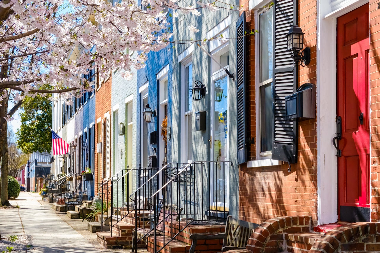 Row of Townhouses in Alexandria, Virginia , with cherry blossoms