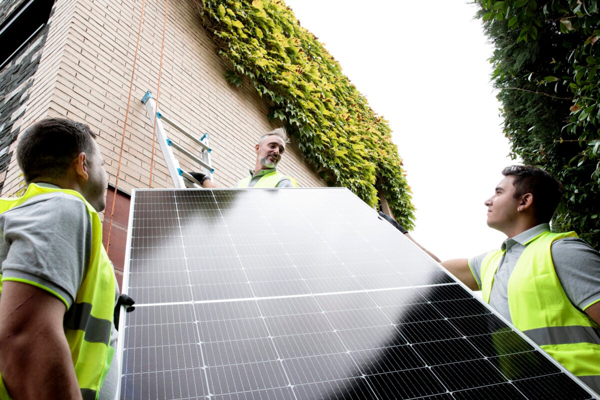 Solar technicians installing solar panels