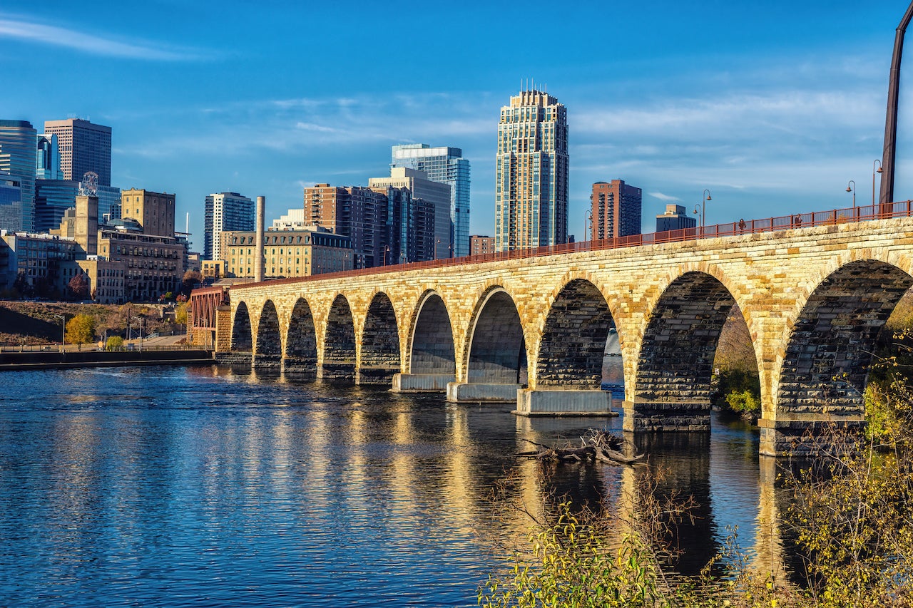 The Stone Arch Bridge leading towards downtown Minneapolis, Minnesota.