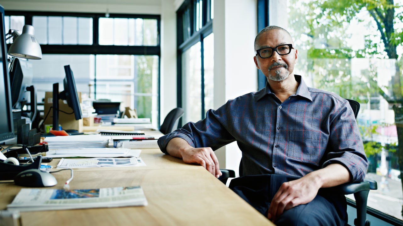 Businessman sitting at desk in office