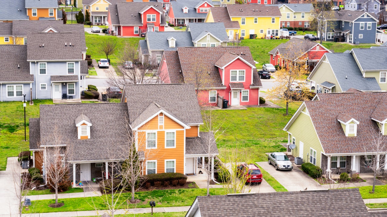 Modern detached houses with individual driveways on a large housing development on the western side of Nashville, Tennessee.