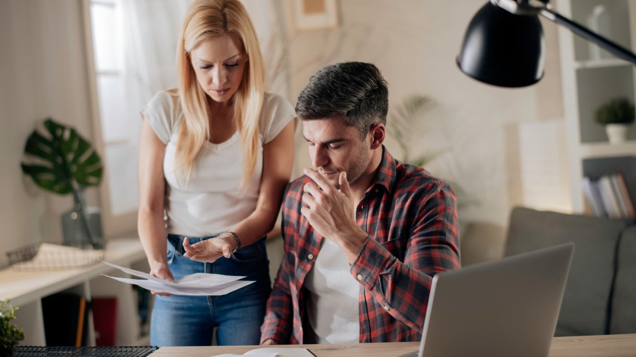 Couple reviewing financial statements