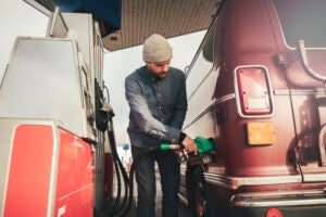 Man pumping gas