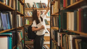 Female university student in library