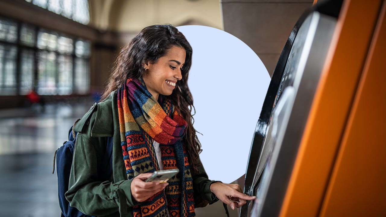 Young woman using the ATM