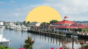 A row of beautiful houses along a body of water