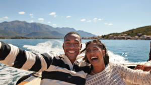 couple takes a selfie on a boat