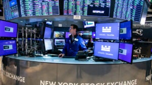 A trader works on the floor of the New York Stock Exchange