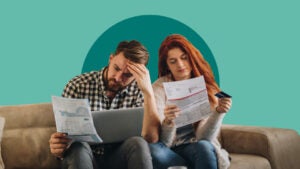 People sitting together, reviewing paperwork