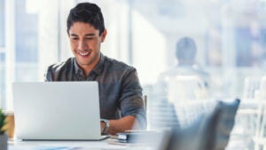 Businessman working on a laptop computer in the office