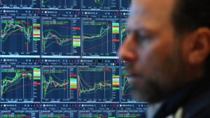 A trader works on the floor of the New York Stock Exchange