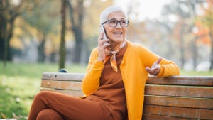 Older woman sitting in the park