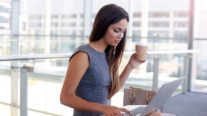 businesswomen working on her laptop in the office