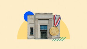 A bank building with a large gold medal hanging from it