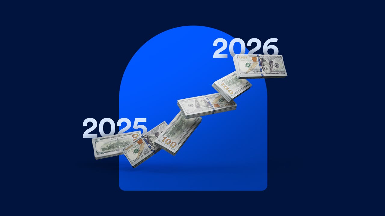 A graph showing an upward trend from 2025 to 2026. The trendline is made of cash