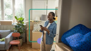 Woman happily looking around her home