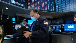 A trader works on the floor of the New York Stock Exchange