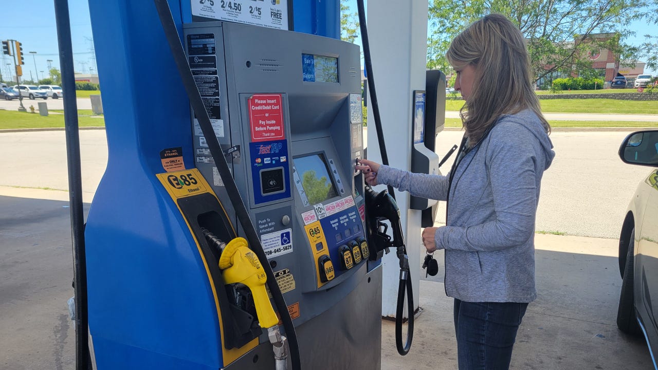 Karen Bennett at the gas pump